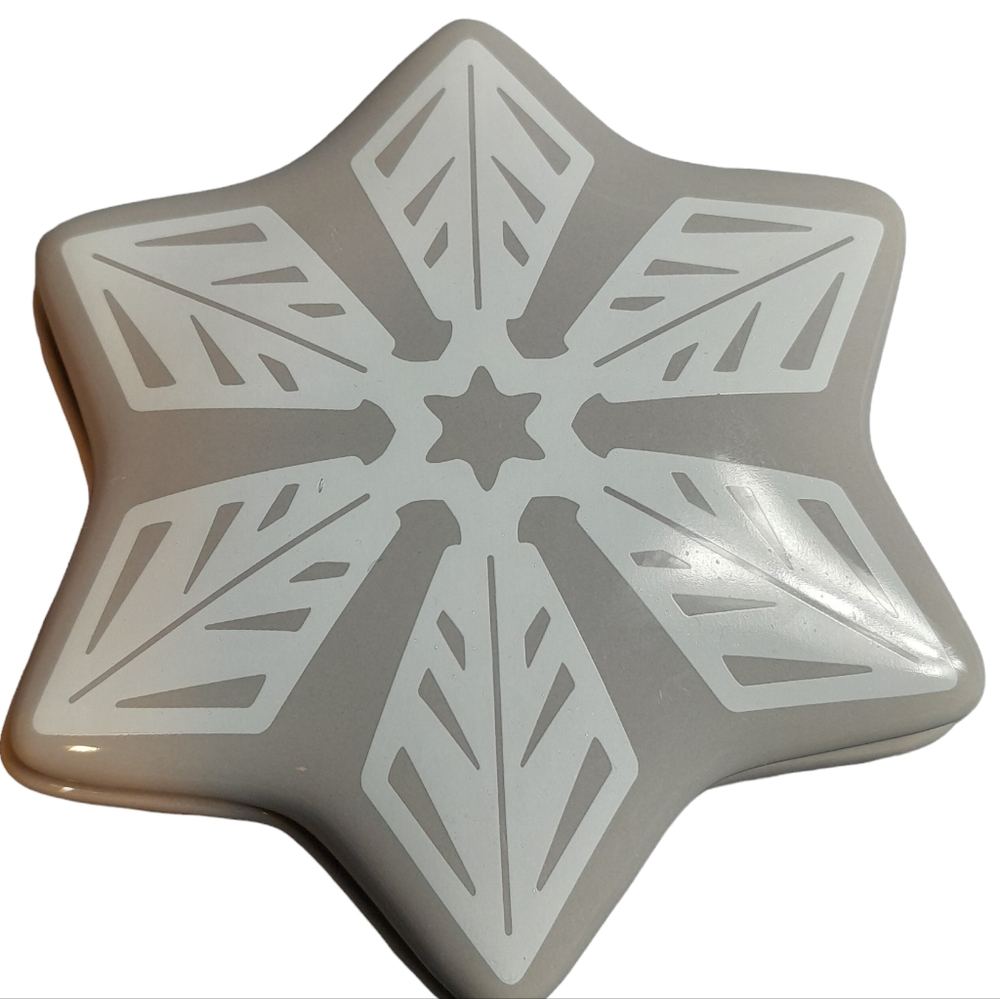 Temtations by tara porcelain dish with cover with a snow flake design